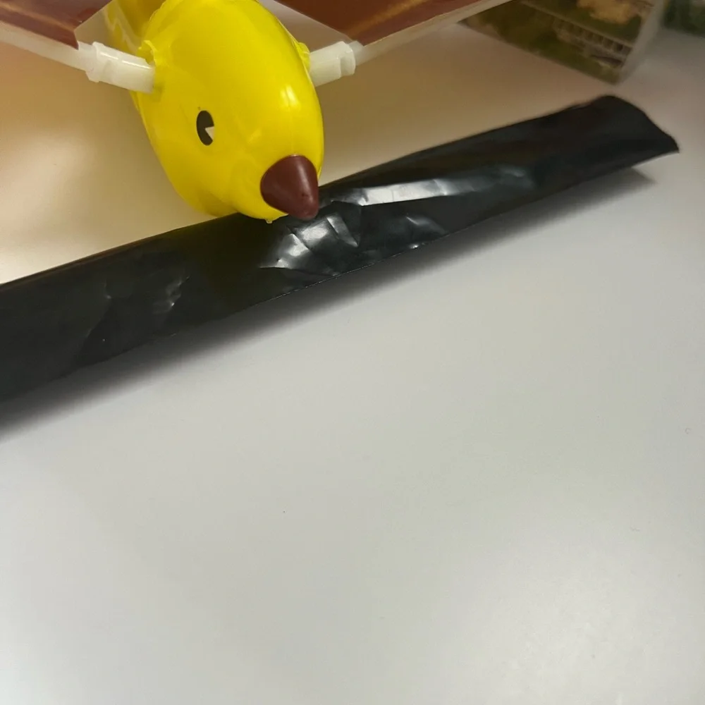Tim Bird Vintage 1983 Flying Bird Toy - Red and Yellow